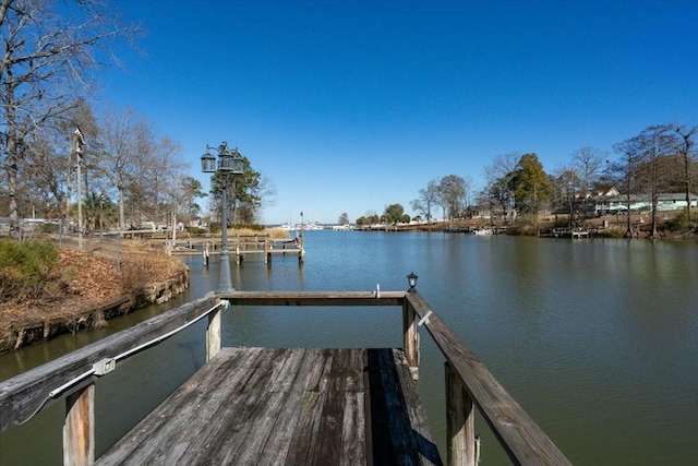 view of dock with a water view