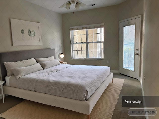 bedroom with tile patterned flooring and access to outside