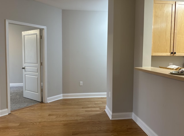 corridor featuring light hardwood / wood-style flooring