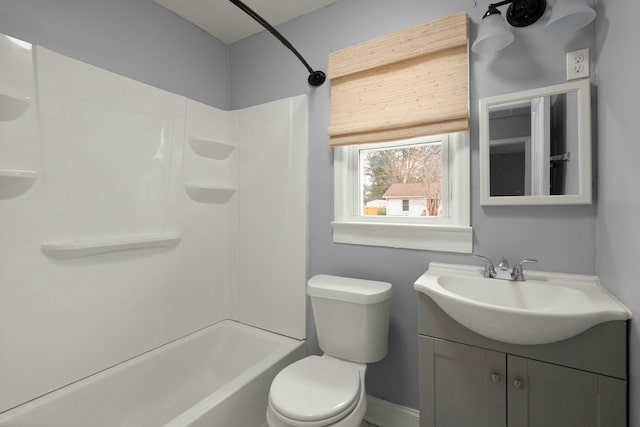 full bathroom with shower / washtub combination, vanity, and toilet