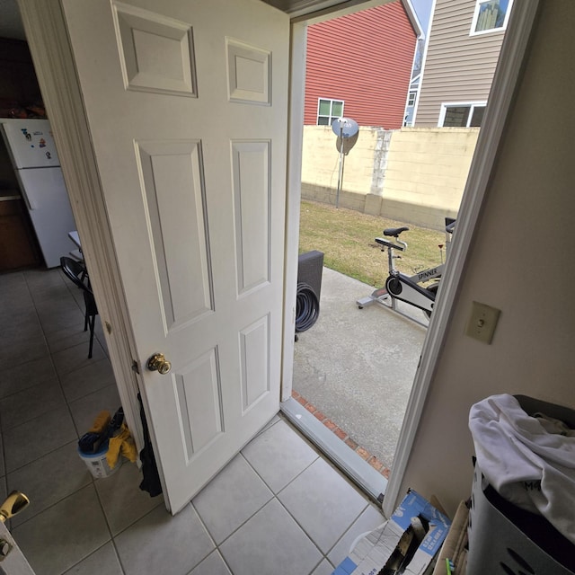 entryway featuring light tile patterned floors