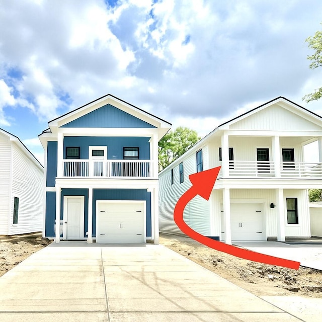 2035 Echo Ave, North Charleston, SC 29405 - coastal home with a balcony, an attached garage, and concrete driveway