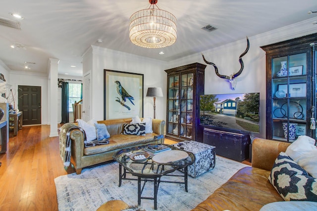 3306 Hartwell St, Johns Island, SC 29455 - living room with crown molding, wood finished floors, a chandelier, and recessed lighting