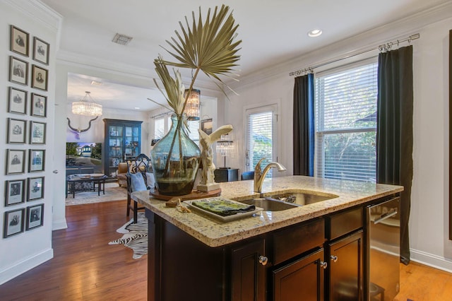3306 Hartwell St, Johns Island, SC 29455 - kitchen featuring a sink, dishwasher, crown molding, baseboards, and dark wood-style floors