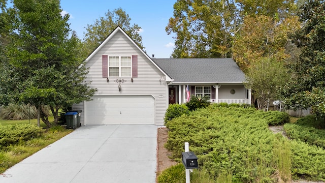 view of front facade with driveway and an attached garage