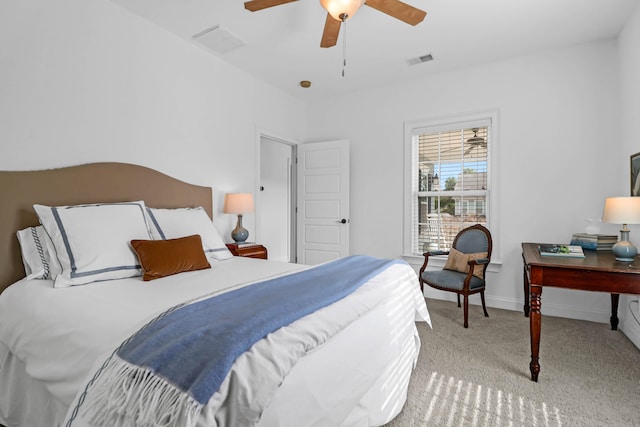 carpeted bedroom featuring ceiling fan