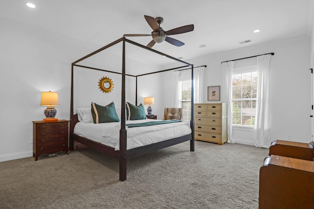 carpeted bedroom with ceiling fan