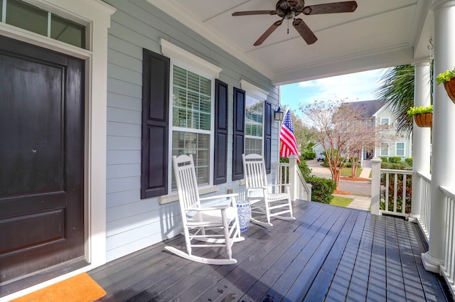 deck with covered porch and ceiling fan