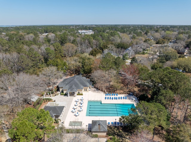 aerial view with a wooded view