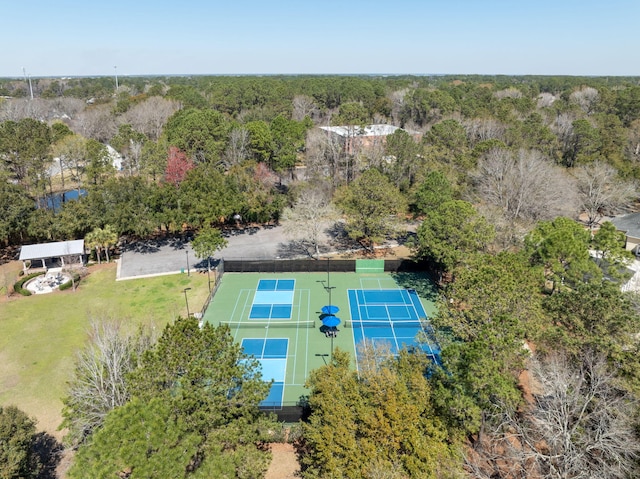 drone / aerial view featuring a view of trees