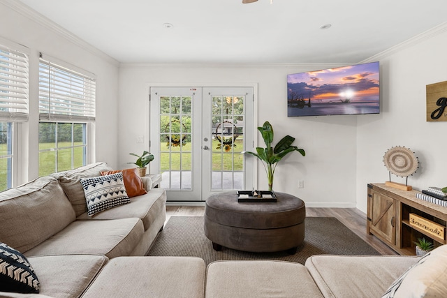 living room with french doors, ornamental molding, and hardwood / wood-style flooring