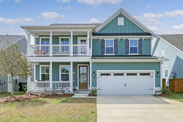 view of front of home featuring covered porch, a front yard, a garage, and a balcony