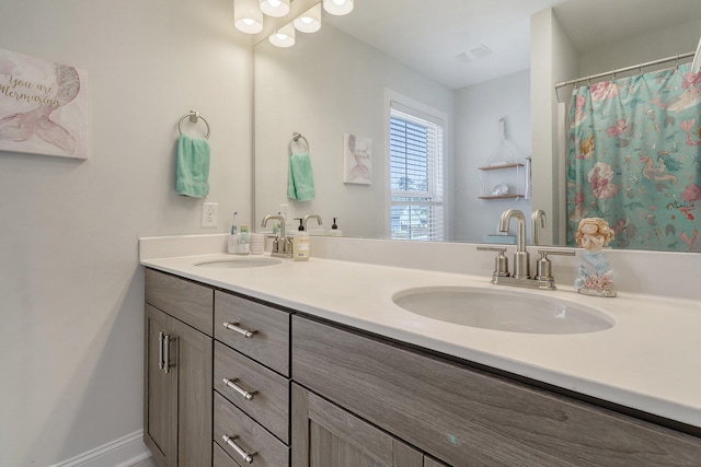 bathroom featuring double vanity