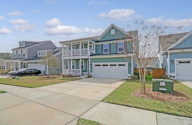 view of front of home featuring a garage and a balcony