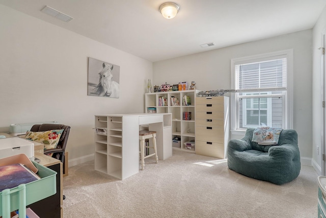 home office featuring a healthy amount of sunlight and carpet