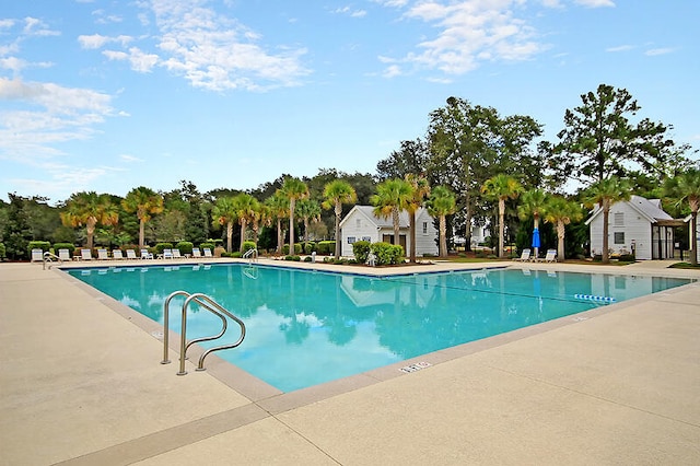 view of swimming pool featuring a patio