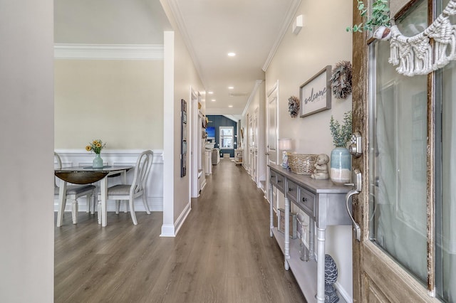 interior space featuring crown molding and wood-type flooring