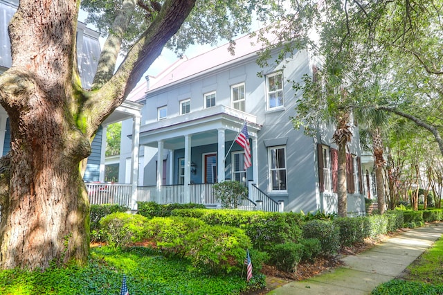 183 Ionsborough St, Mount Pleasant, SC 29464 - view of front of home featuring covered porch and stucco siding