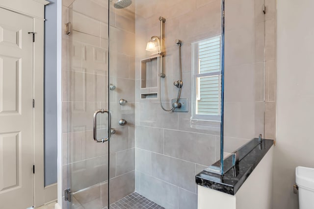 183 Ionsborough St, Mount Pleasant, SC 29464 - bathroom featuring a stall shower and toilet