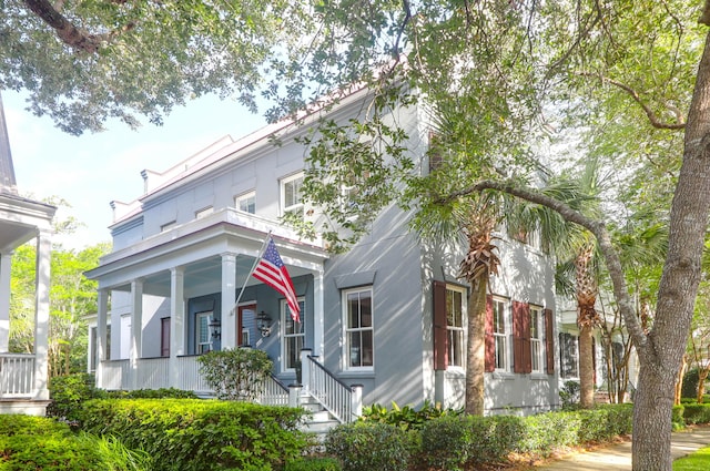 183 Ionsborough St, Mount Pleasant, SC 29464 - view of front facade featuring covered porch and stucco siding