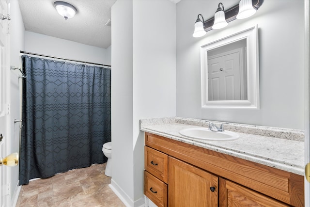 7813 Sandida Ct, North Charleston, SC 29418 - bathroom featuring vanity, toilet, a textured ceiling, and a shower with shower curtain