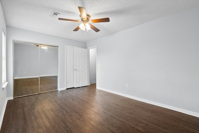 7813 Sandida Ct, North Charleston, SC 29418 - unfurnished bedroom with wood finished floors, baseboards, a closet, a textured ceiling, and ceiling fan