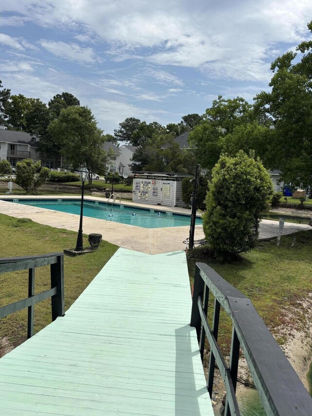 7813 Sandida Ct, North Charleston, SC 29418 - community pool with a lawn