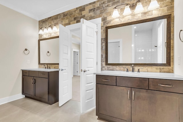 bathroom with tile patterned flooring and vanity