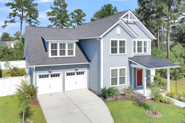 view of front facade featuring a garage and a front lawn