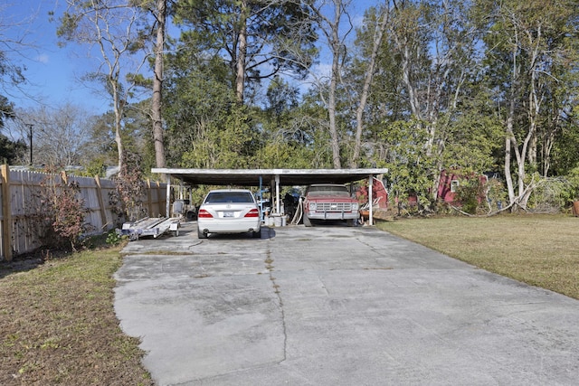 view of parking featuring a carport and a lawn