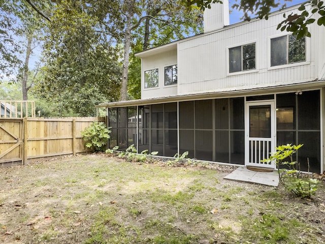 10 Stallion Ct, Charleston, SC 29407 - rear view of property with a sunroom and a chimney