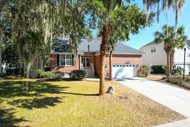 view of front of house with a garage and a front yard