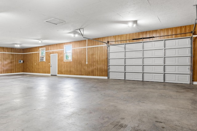 4097 NE Brown St, Orangeburg, SC 29118 - garage featuring wooden walls and baseboards