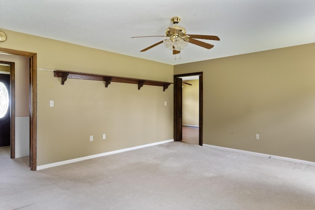 4097 NE Brown St, Orangeburg, SC 29118 - empty room featuring ceiling fan, light carpet, and baseboards