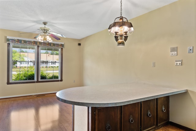 4097 NE Brown St, Orangeburg, SC 29118 - dining space with wood finished floors, ceiling fan, baseboards, and a chandelier