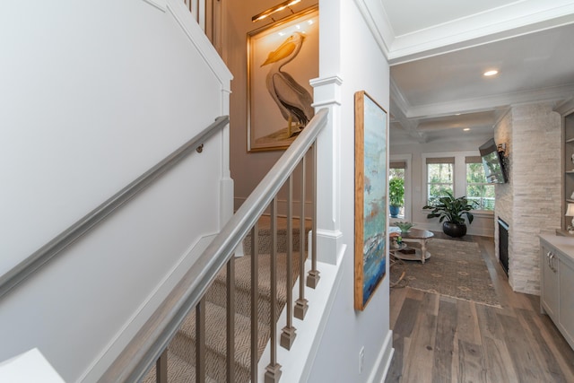 staircase featuring ornamental molding, recessed lighting, and wood finished floors