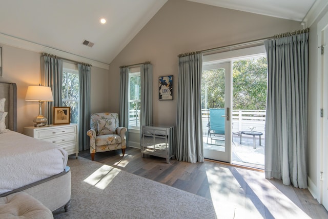 bedroom with recessed lighting, wood finished floors, visible vents, access to exterior, and vaulted ceiling