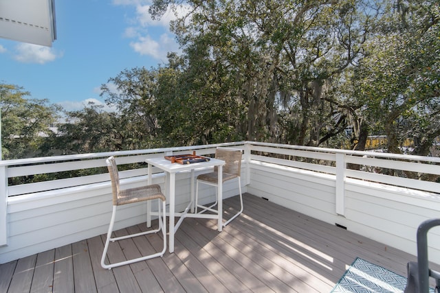 deck with an outdoor fire pit