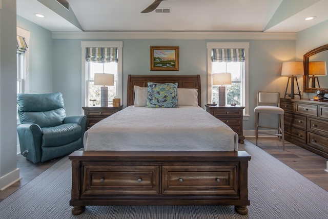 bedroom featuring baseboards, multiple windows, visible vents, and recessed lighting