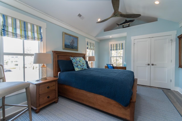 bedroom with lofted ceiling, recessed lighting, a ceiling fan, visible vents, and a closet