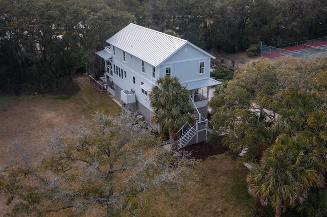 bird's eye view featuring a view of trees