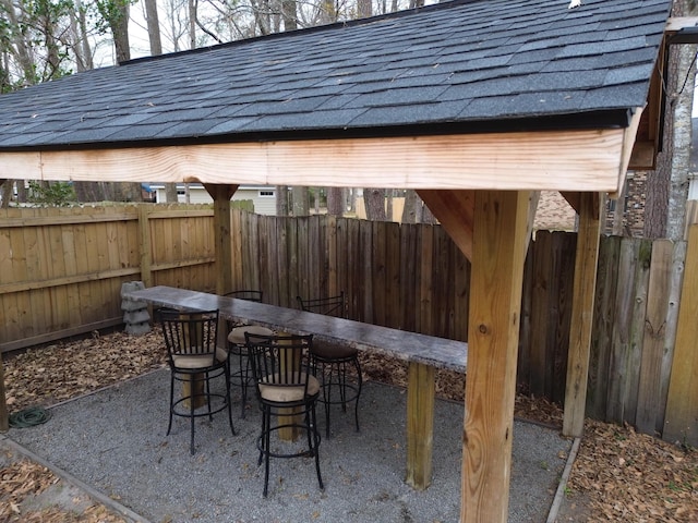 view of patio featuring a bar