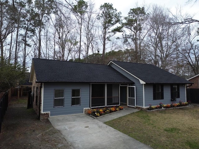 ranch-style house with a front yard