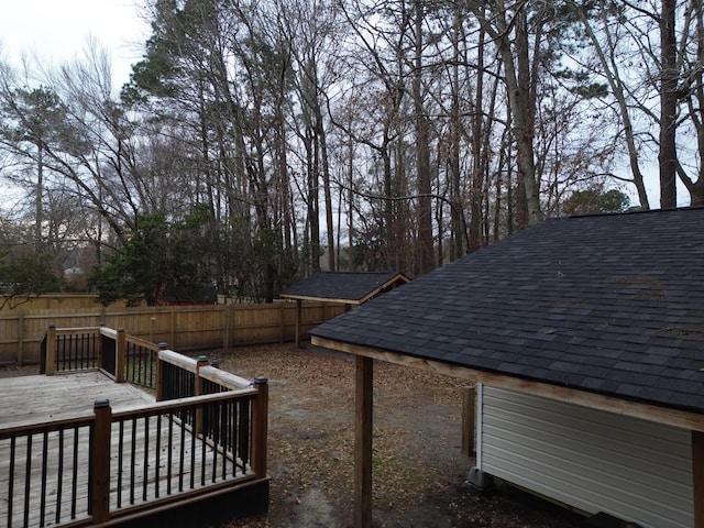 view of yard featuring a wooden deck