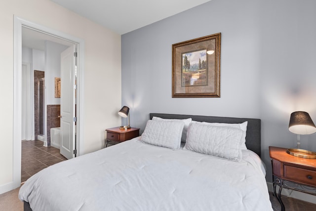 bedroom featuring connected bathroom