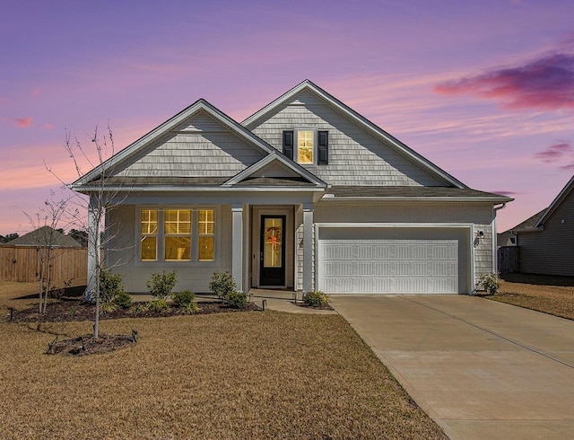 view of front facade featuring a garage and driveway