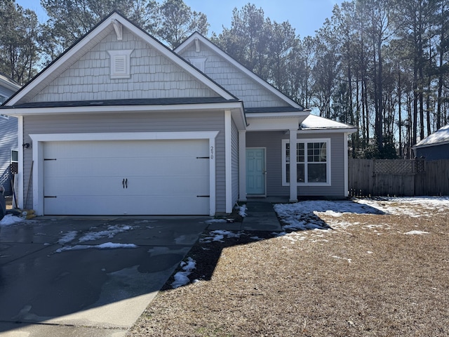 view of front of property with a garage