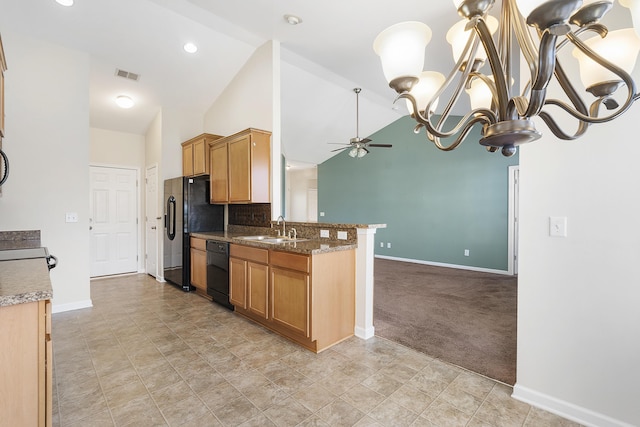 kitchen with baseboards, visible vents, a sink, black appliances, and ceiling fan with notable chandelier