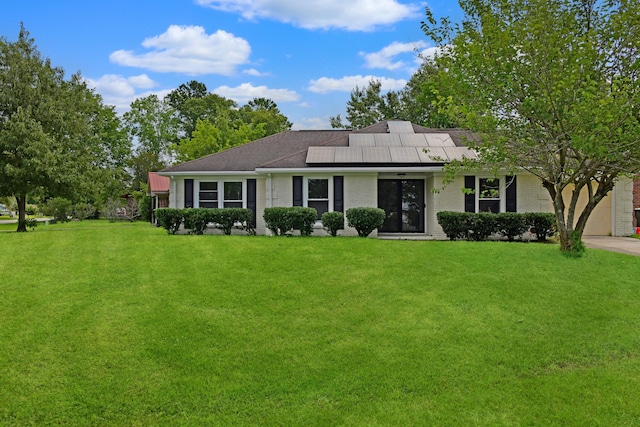 1101 Stuart Dr, Moncks Corner, SC 29461 - view of front of property featuring solar panels, a front lawn, and brick siding