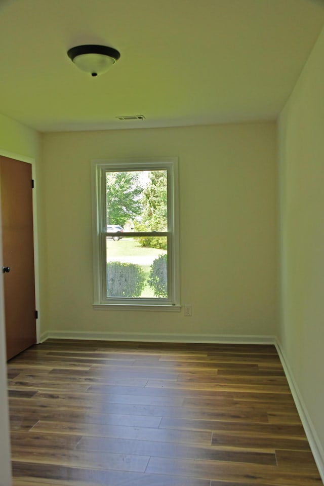 1101 Stuart Dr, Moncks Corner, SC 29461 - spare room with dark wood-type flooring and baseboards